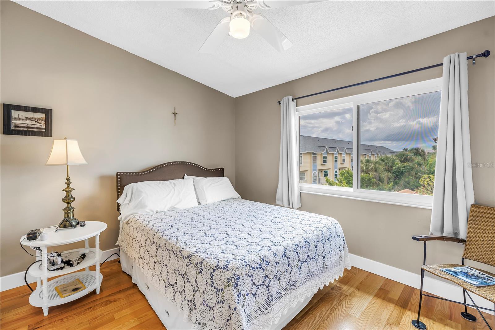 #rd bedroom with wood floors