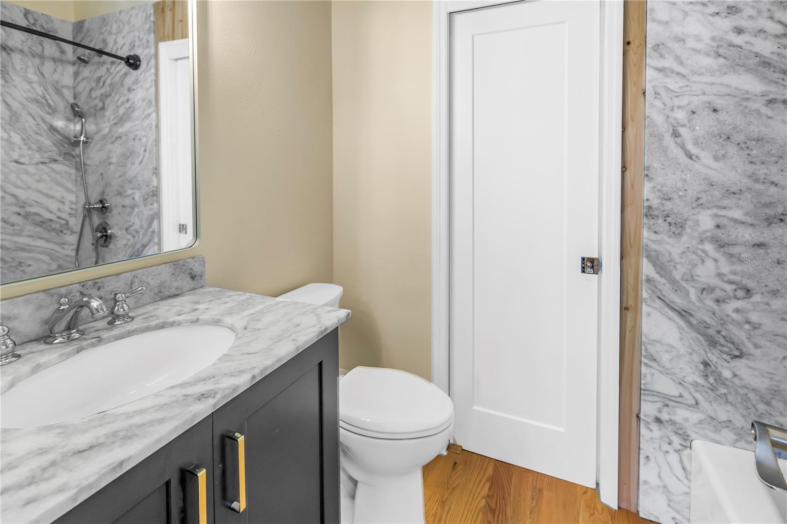 3rd bath with updated cabinet