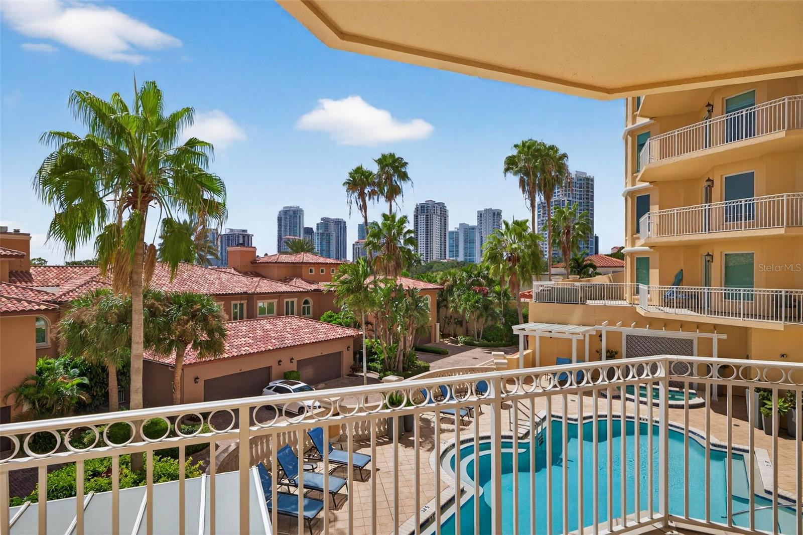 Views of the city skyline and the pool