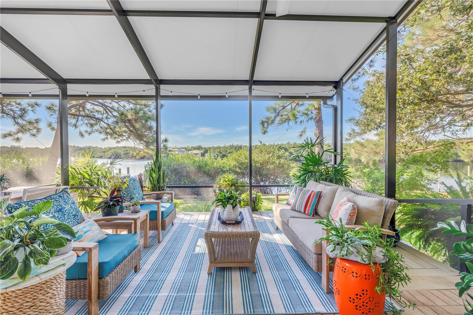 500+ SF Elevated Screened Porch with a panoramic view of back preserve waters