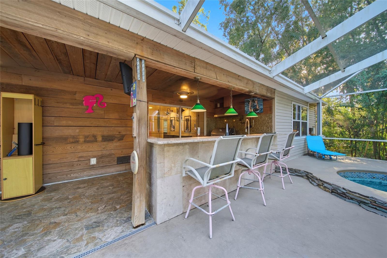 Pool area kitchen and entertaining area