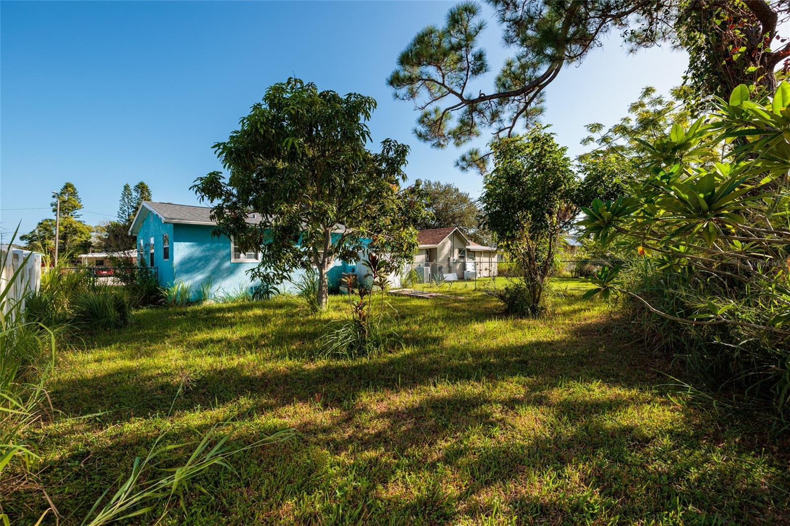 Deep lot with trees and shrubs