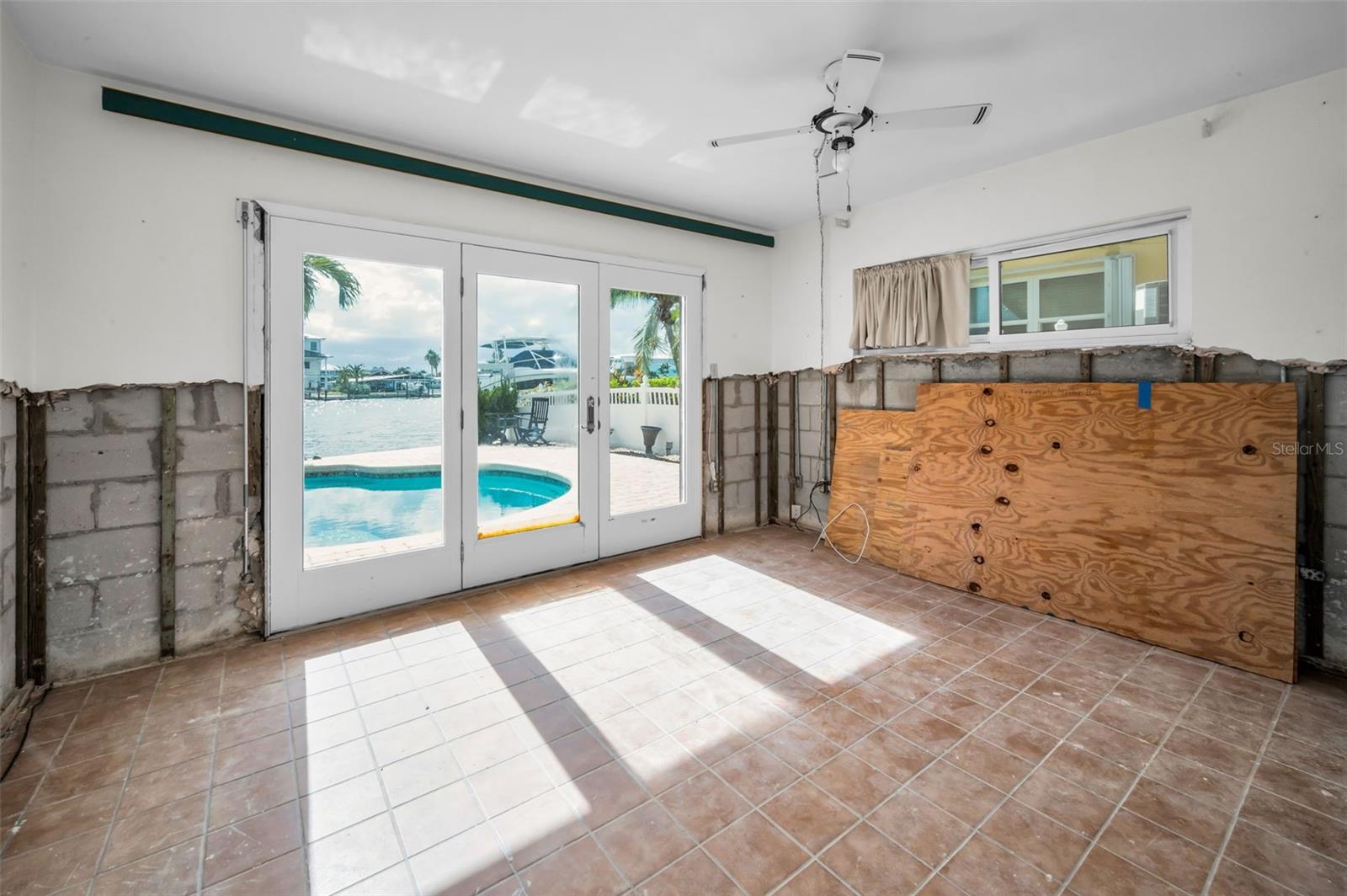 First floor bedroom with water view.