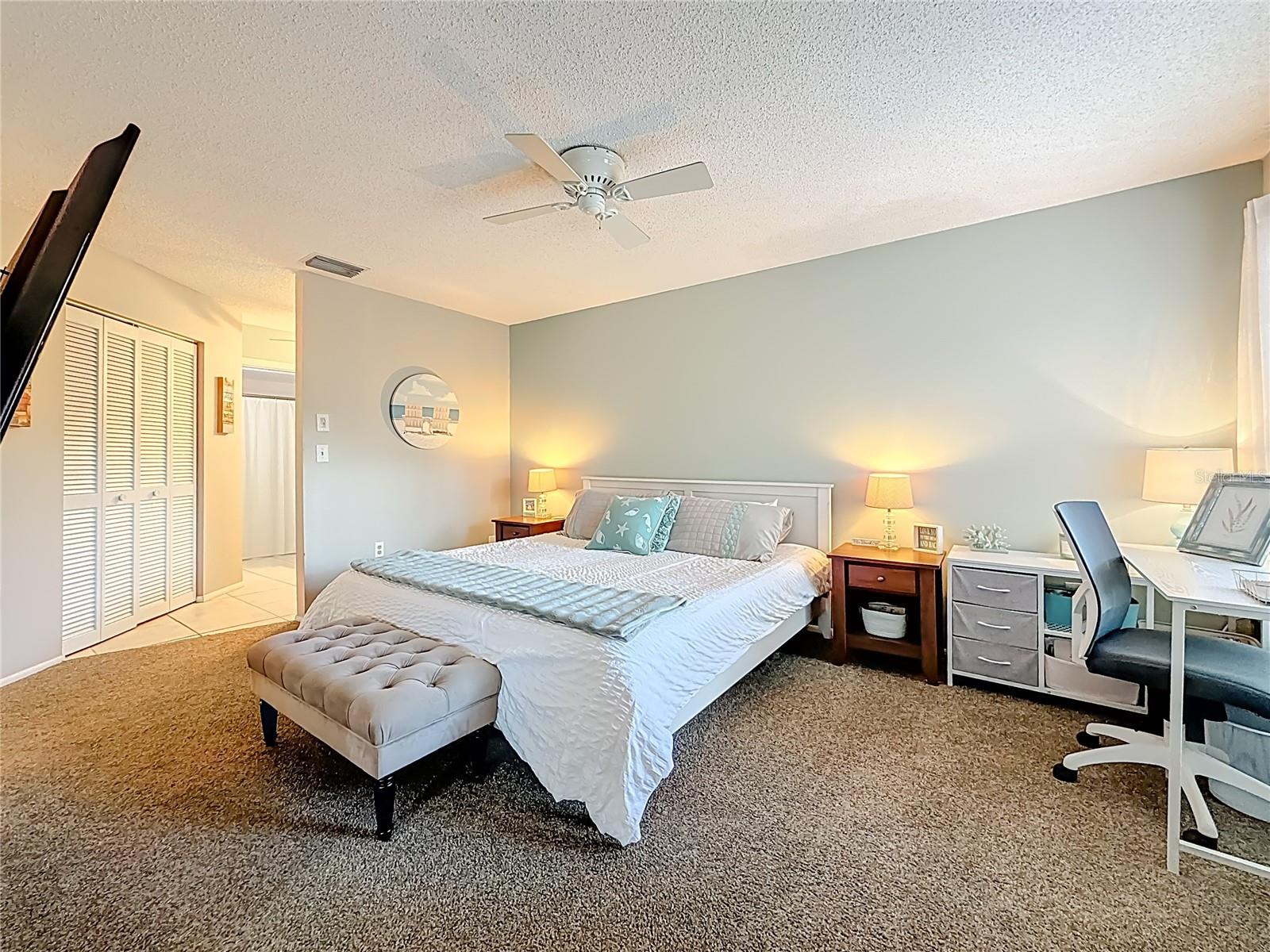 Primary Bedroom with En Suite Bathroom and Large Walk-In Closet