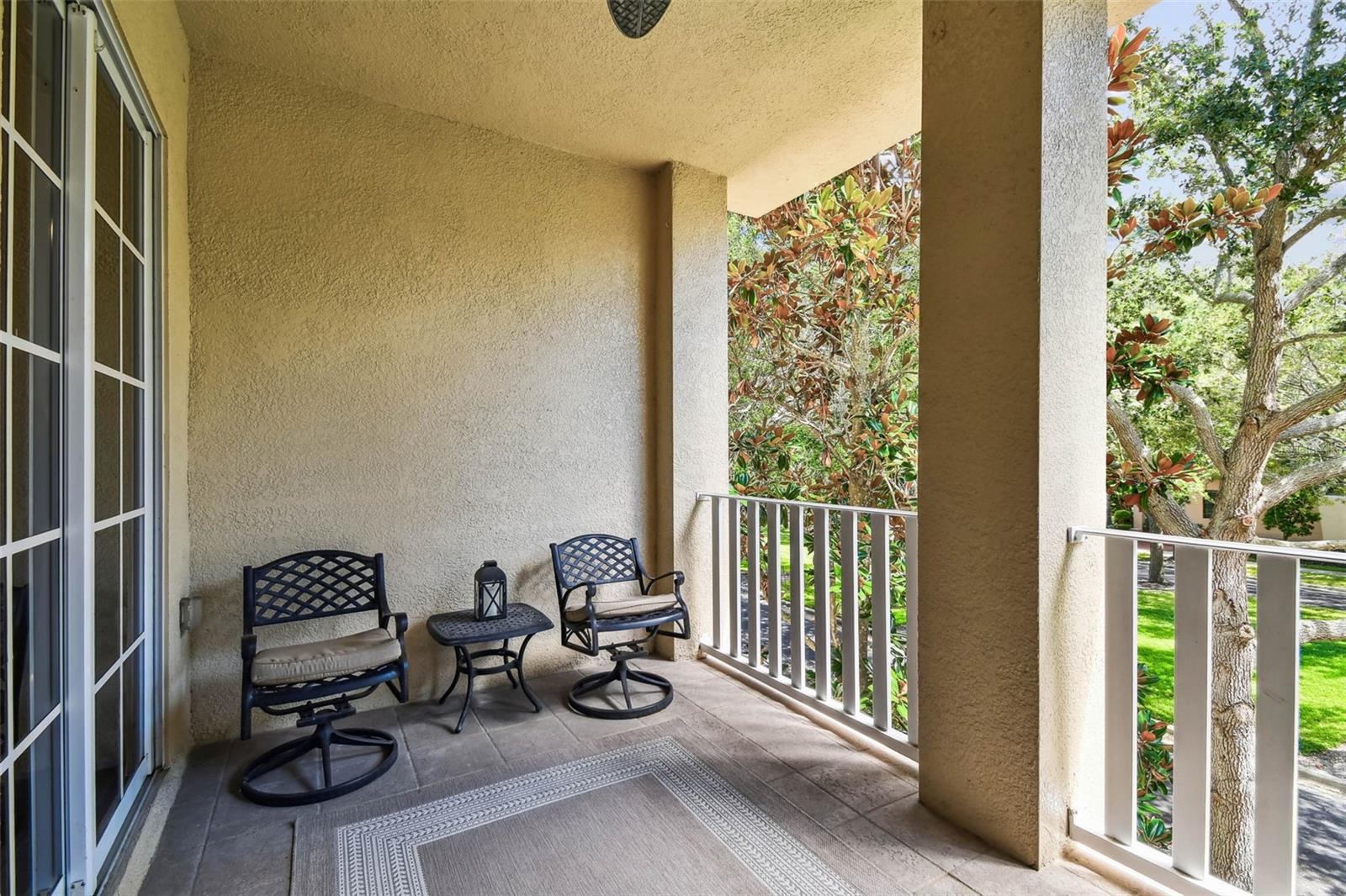 Second level patio overlooking grass space