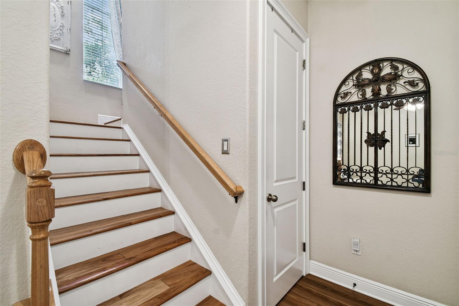 Stairs from foyer to second level