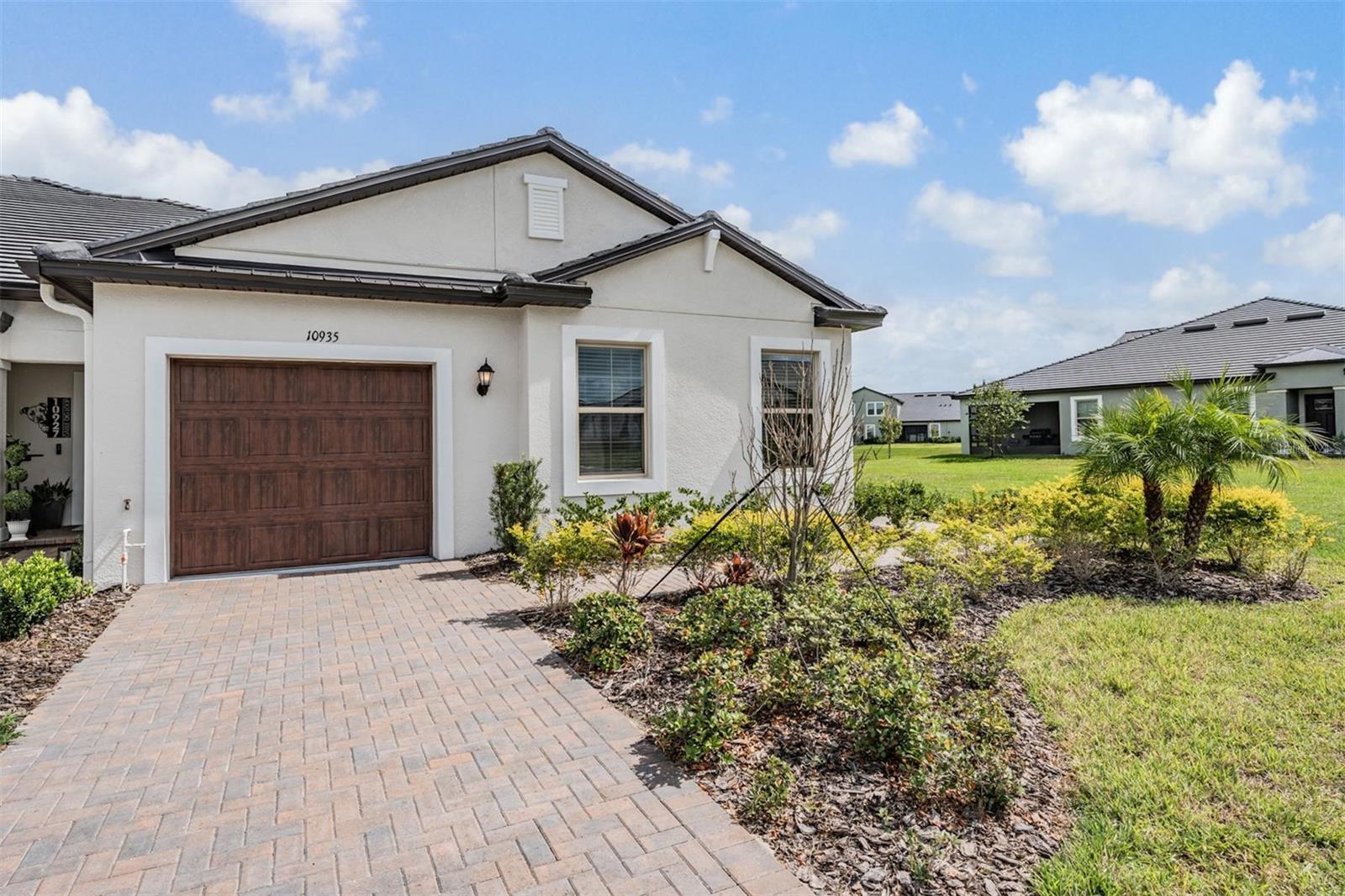 Tropical landscaping and pavered driveway!