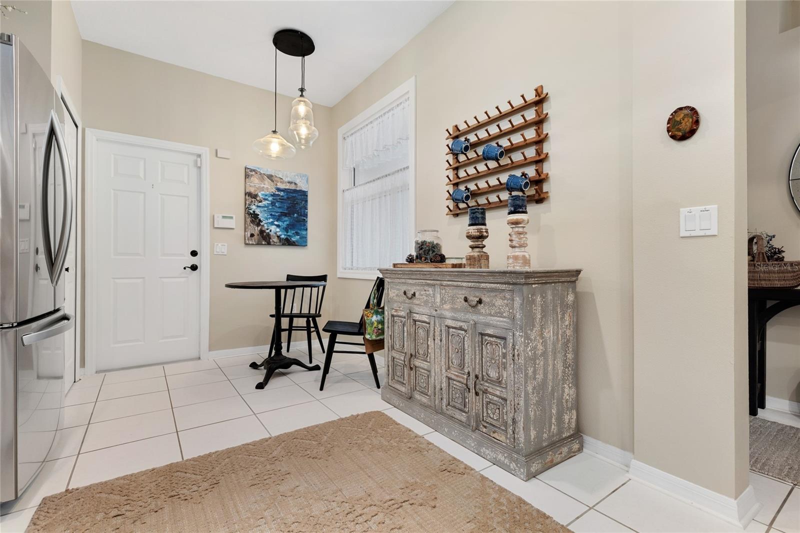 ENTRANCE TO KITCHEN FROM GARAGE WITH BREAKFAST NOOK