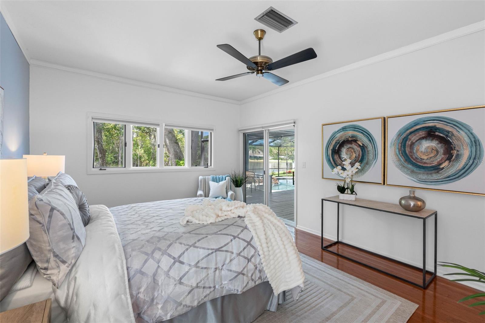 Primary Bedroom has pool and pond views