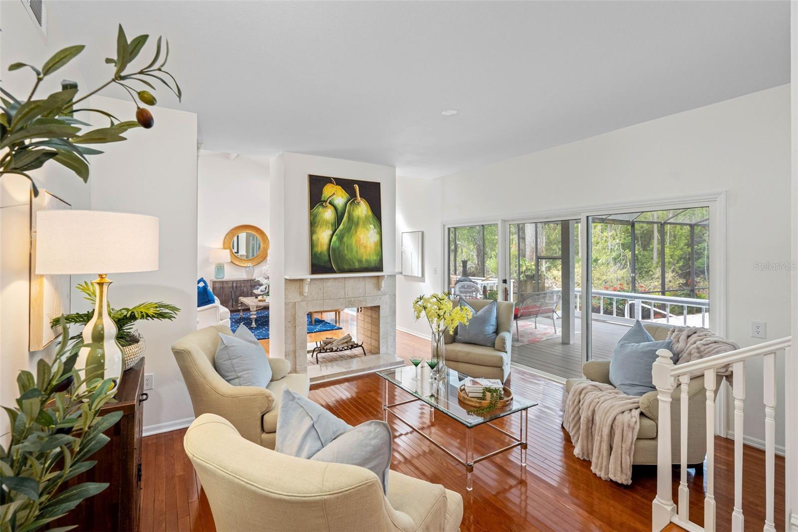 The family room is on the other side of the open Fireplace