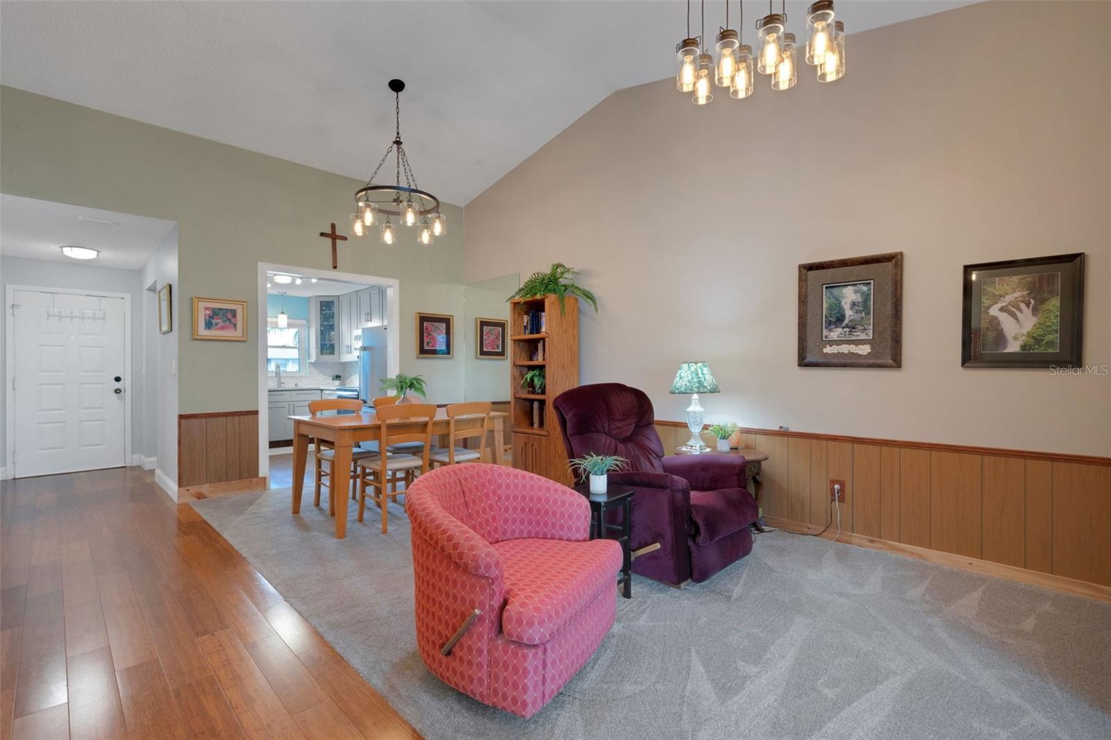Volume ceilings, stylist chair rail and paneling