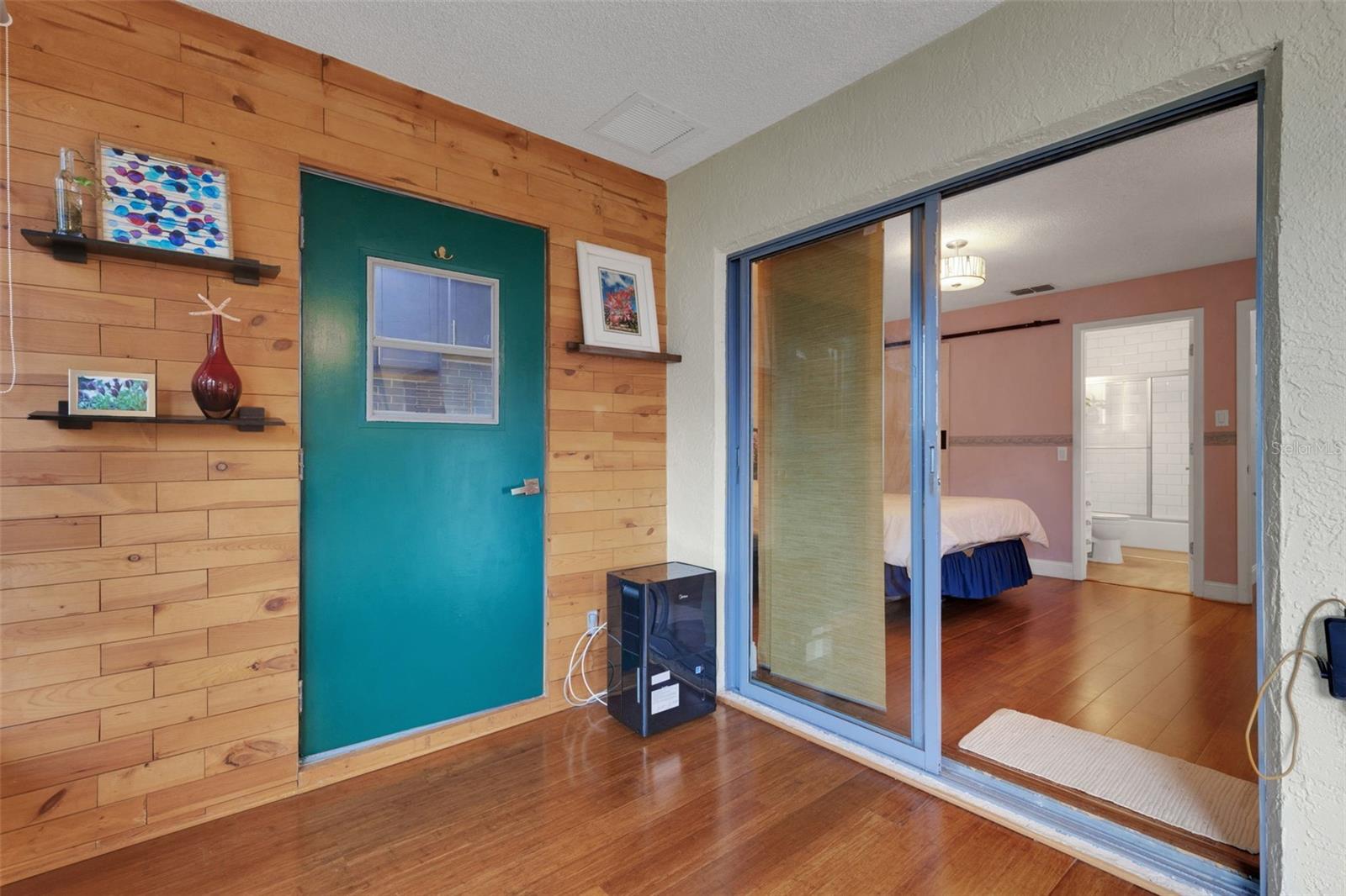 Sliding door to Primary suite from Florida Room
