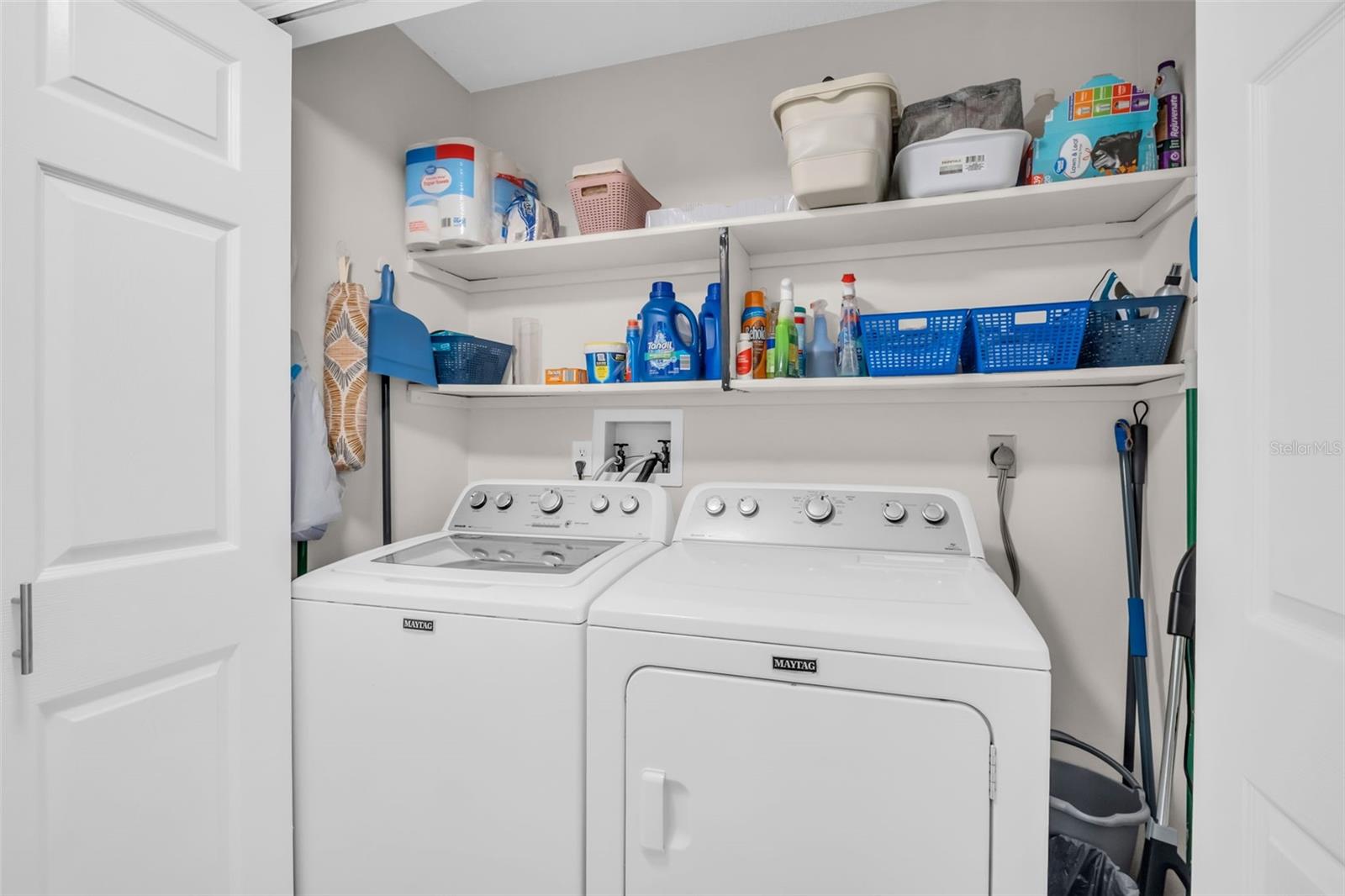 CONVENIENT LAUNDRY CLOSET WITH 4 YEAR OLD MAYTAG WASHER AND DRYER