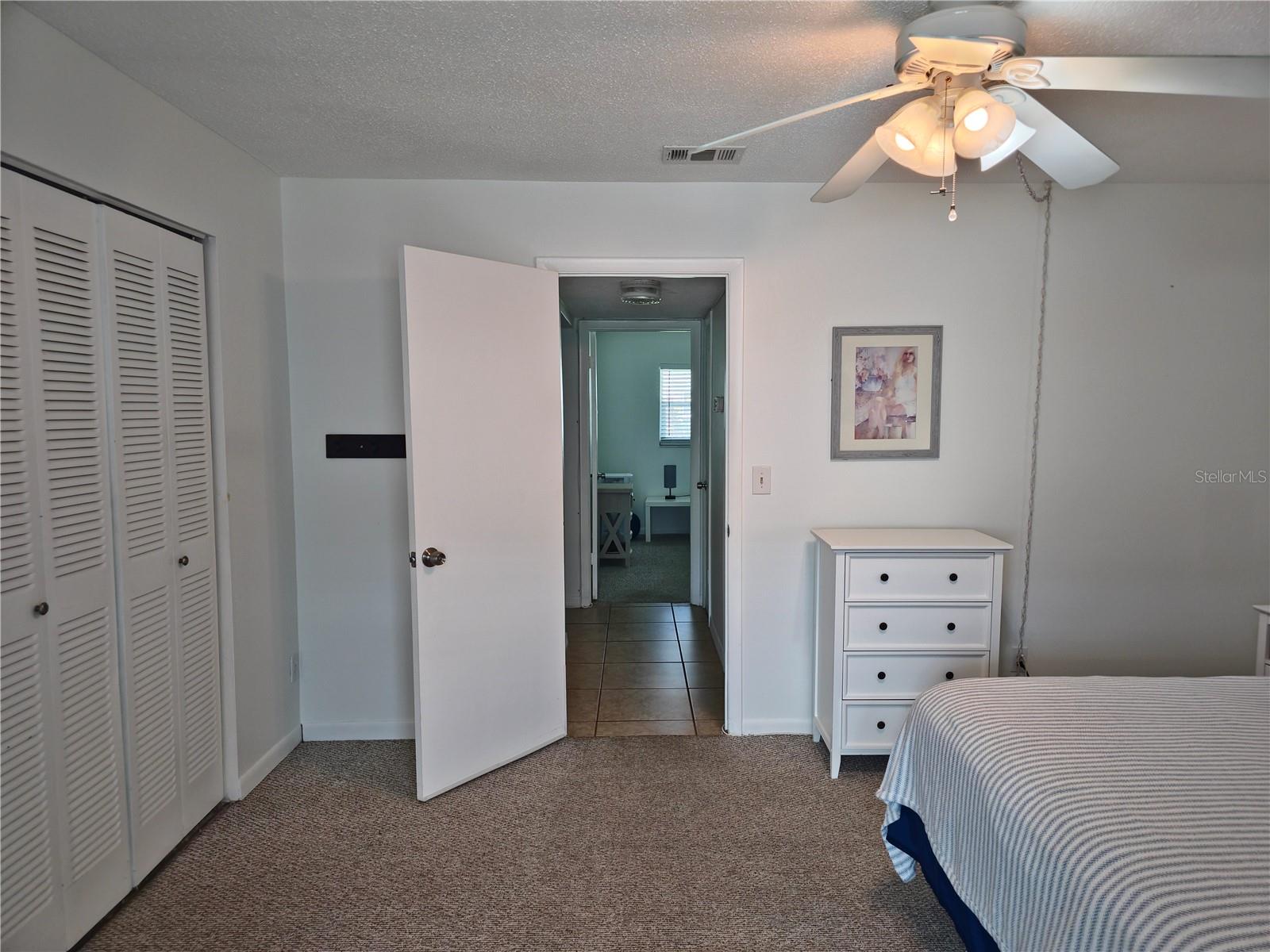 1st Bedroom leading to the bathroom