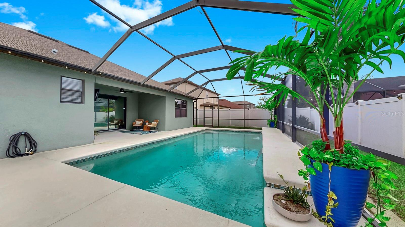 EXTENDED PATIO SPACE - PLENTY OF ROOM FOR ENTERTAINMENT