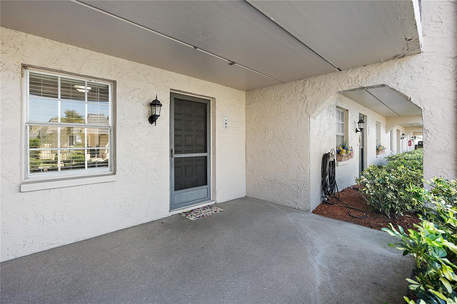 Front patio with space for a bistro table / bench