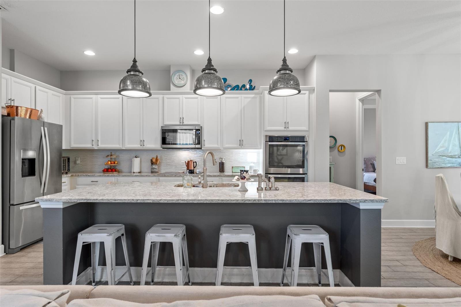 A perfect blend of style and functionality featuring coordinated lighting, premium finishes, and plenty of storage throughout.
