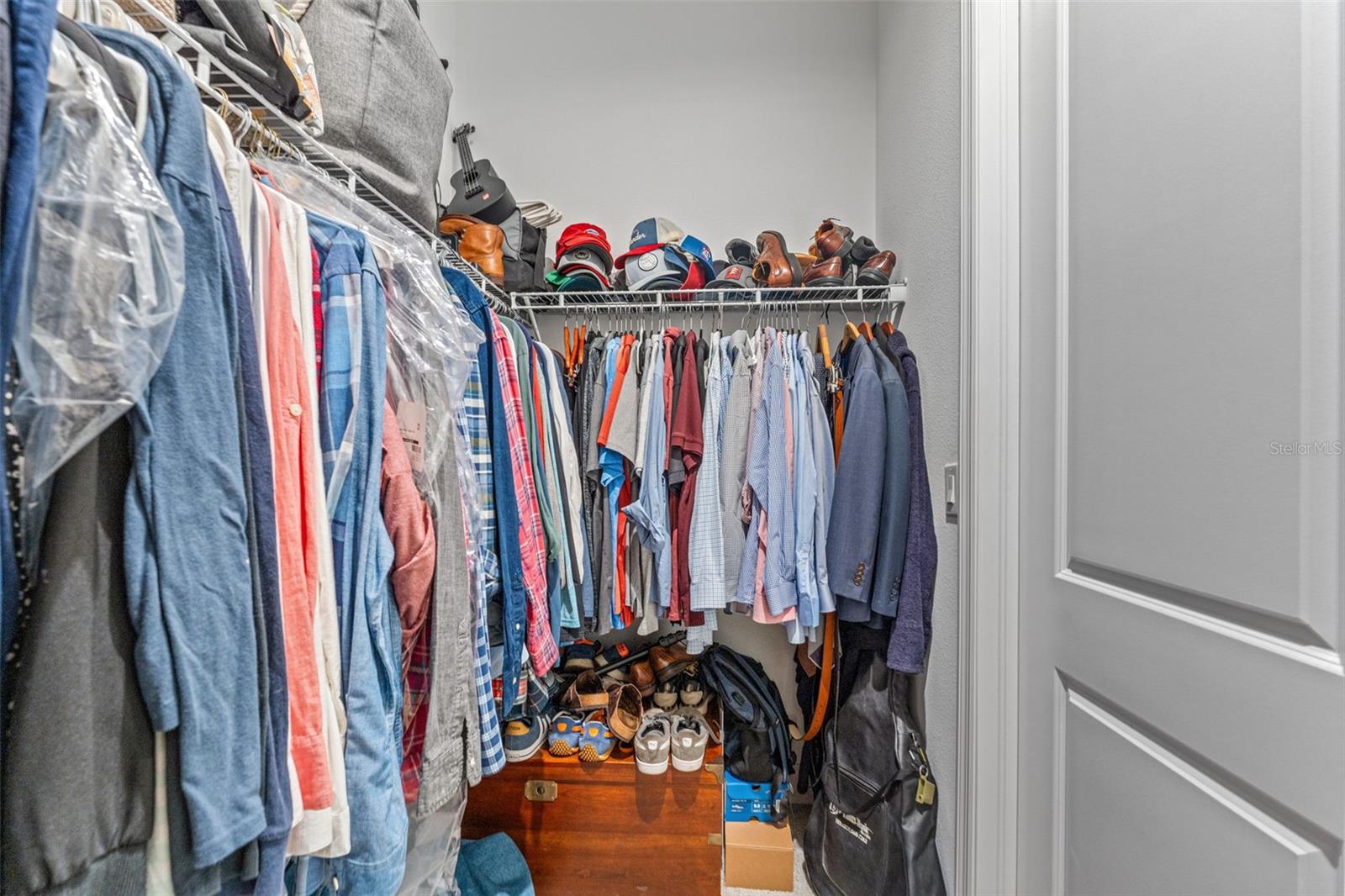 His-and-hers closet configuration provides separation and storage versatility to fit every wardrobe.