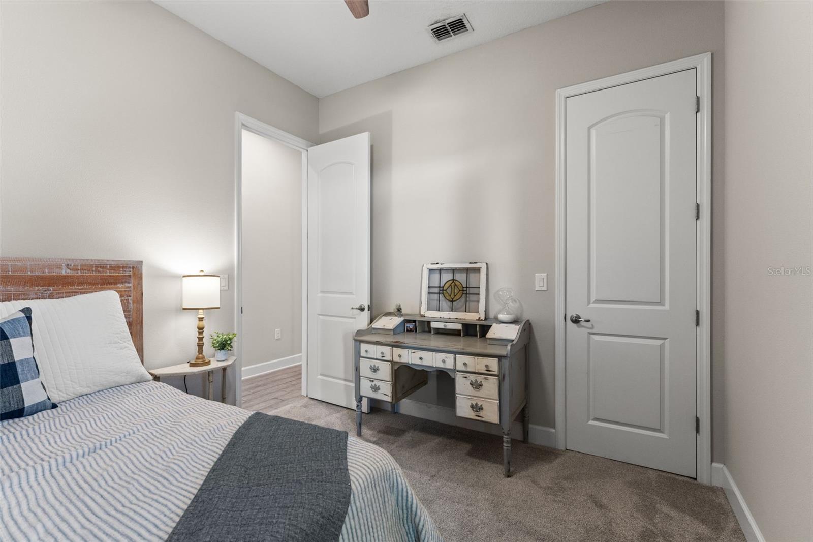 Bright and airy layout with neutral carpeting and generous closet space, offering versatility for any use.