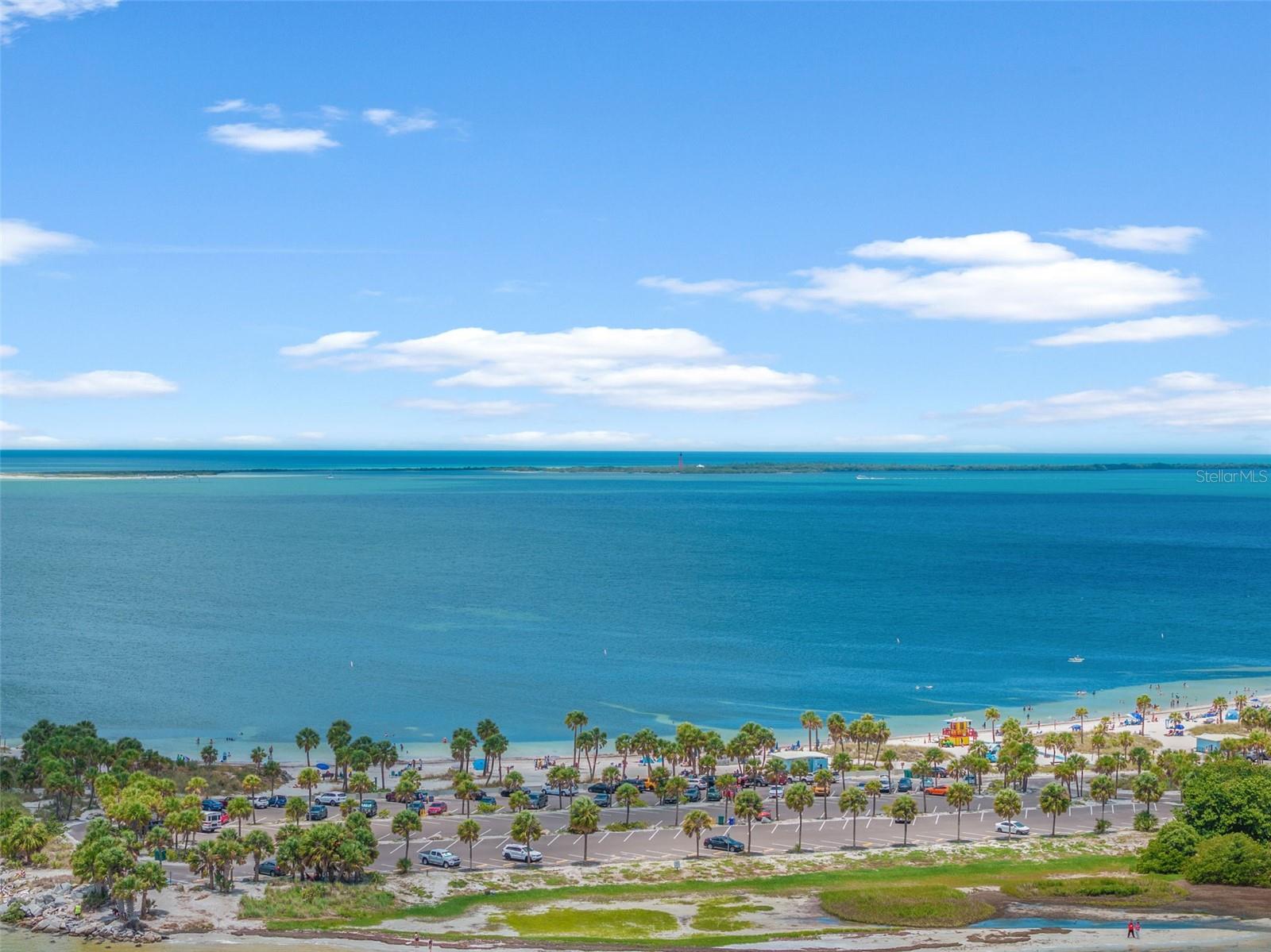 Showcases crystal-blue waters, sandy shoreline, and endless recreation opportunities minutes from your doorstep.