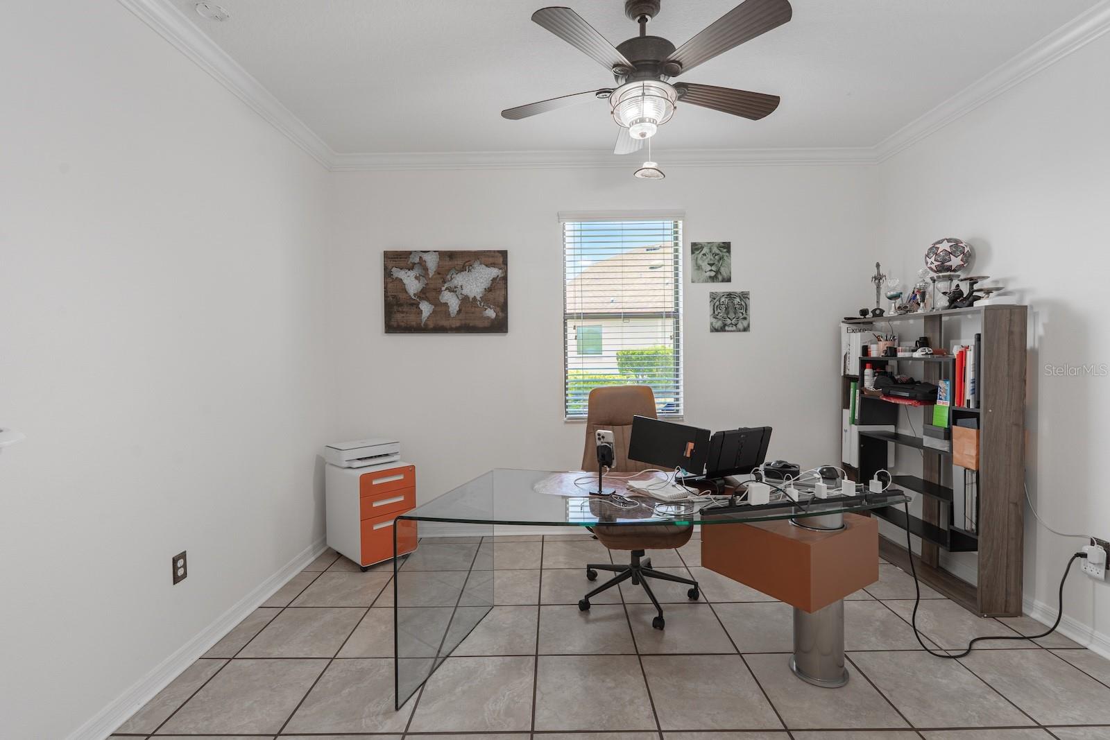 Office space is conveniently located on the main floor and can easily function as a sixth bedroom.
