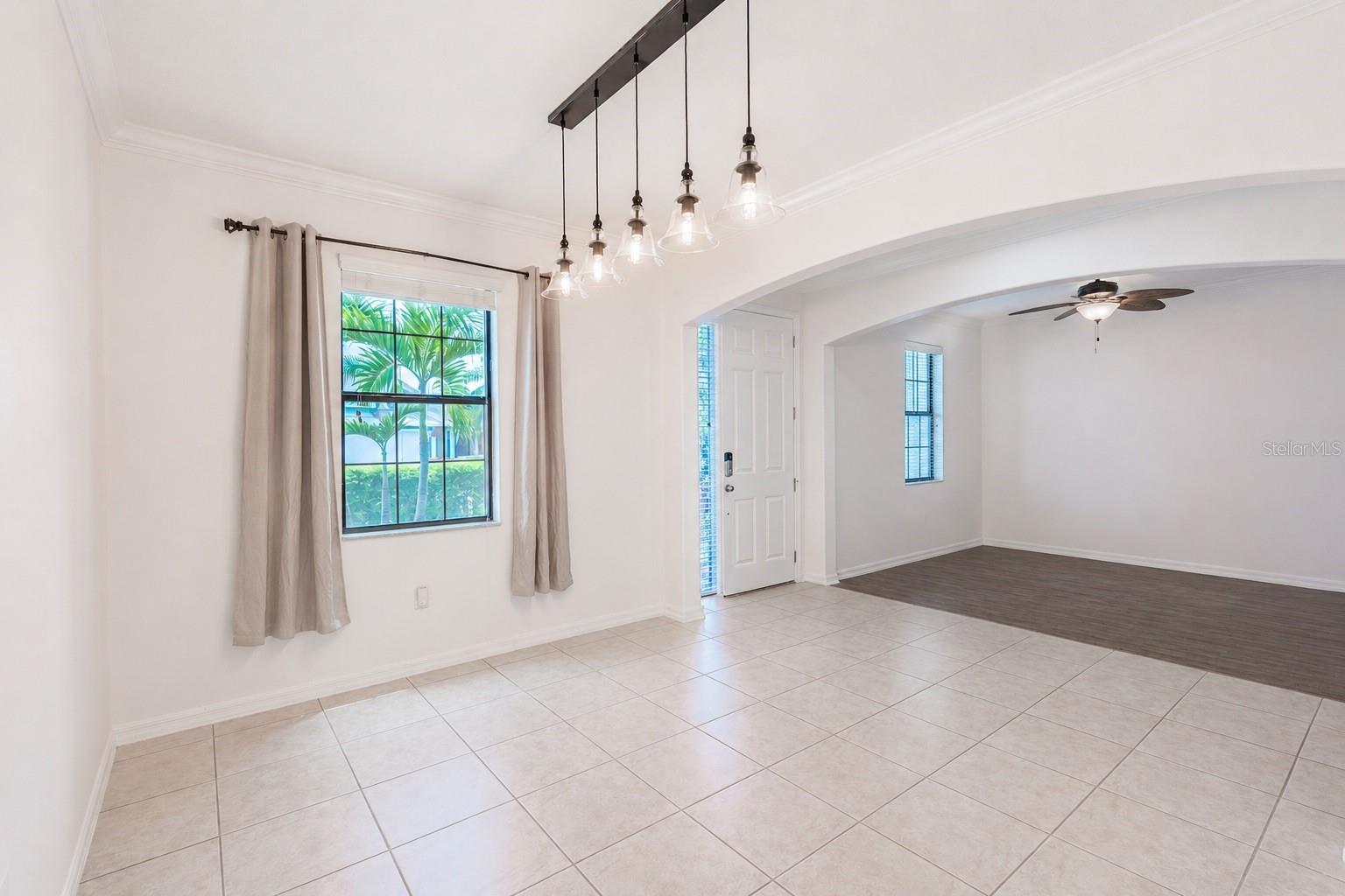Dining room features a clear view overlooking the front of the home.