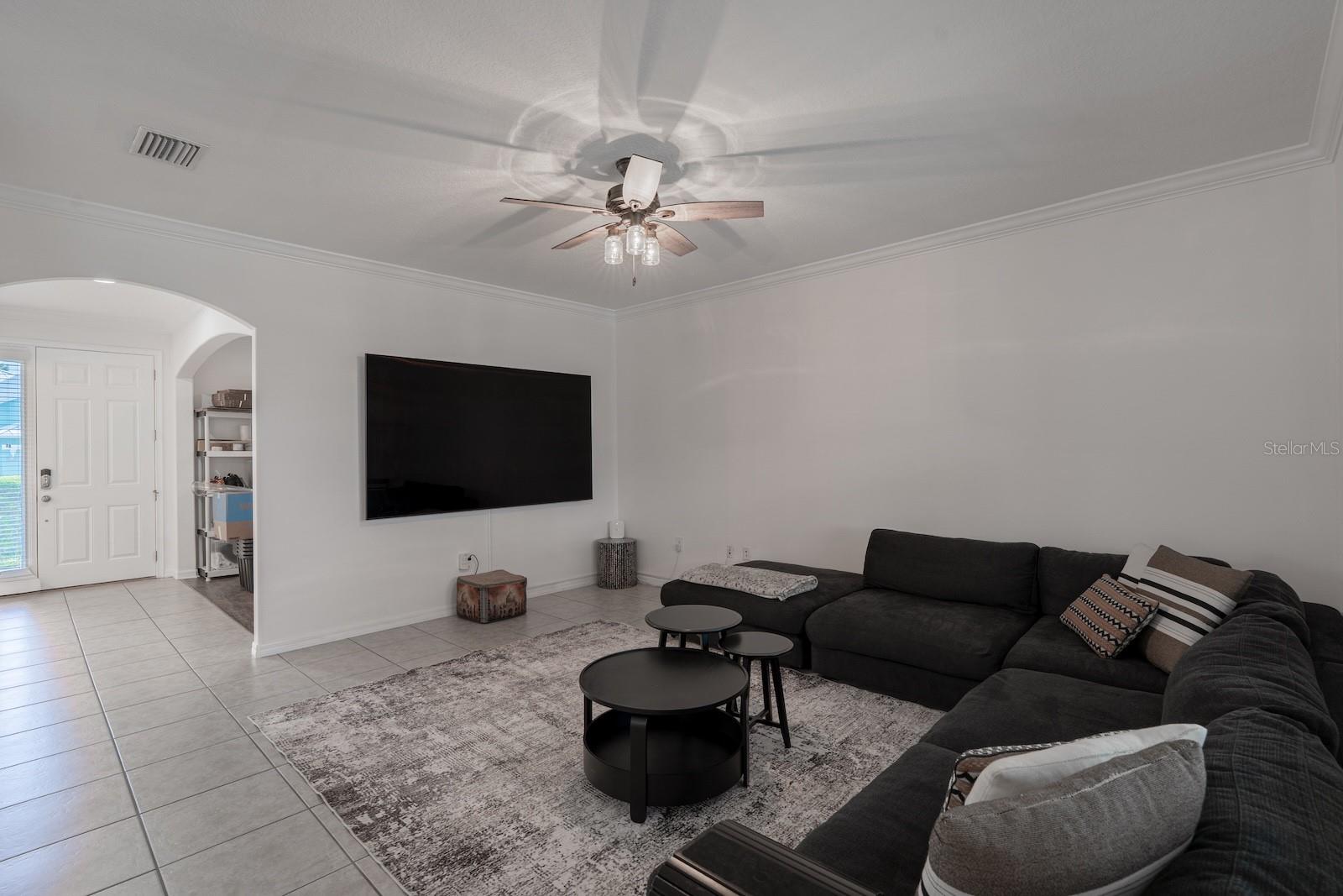 Cozy and comfortable family room with plenty of natural light and space for entertaining.