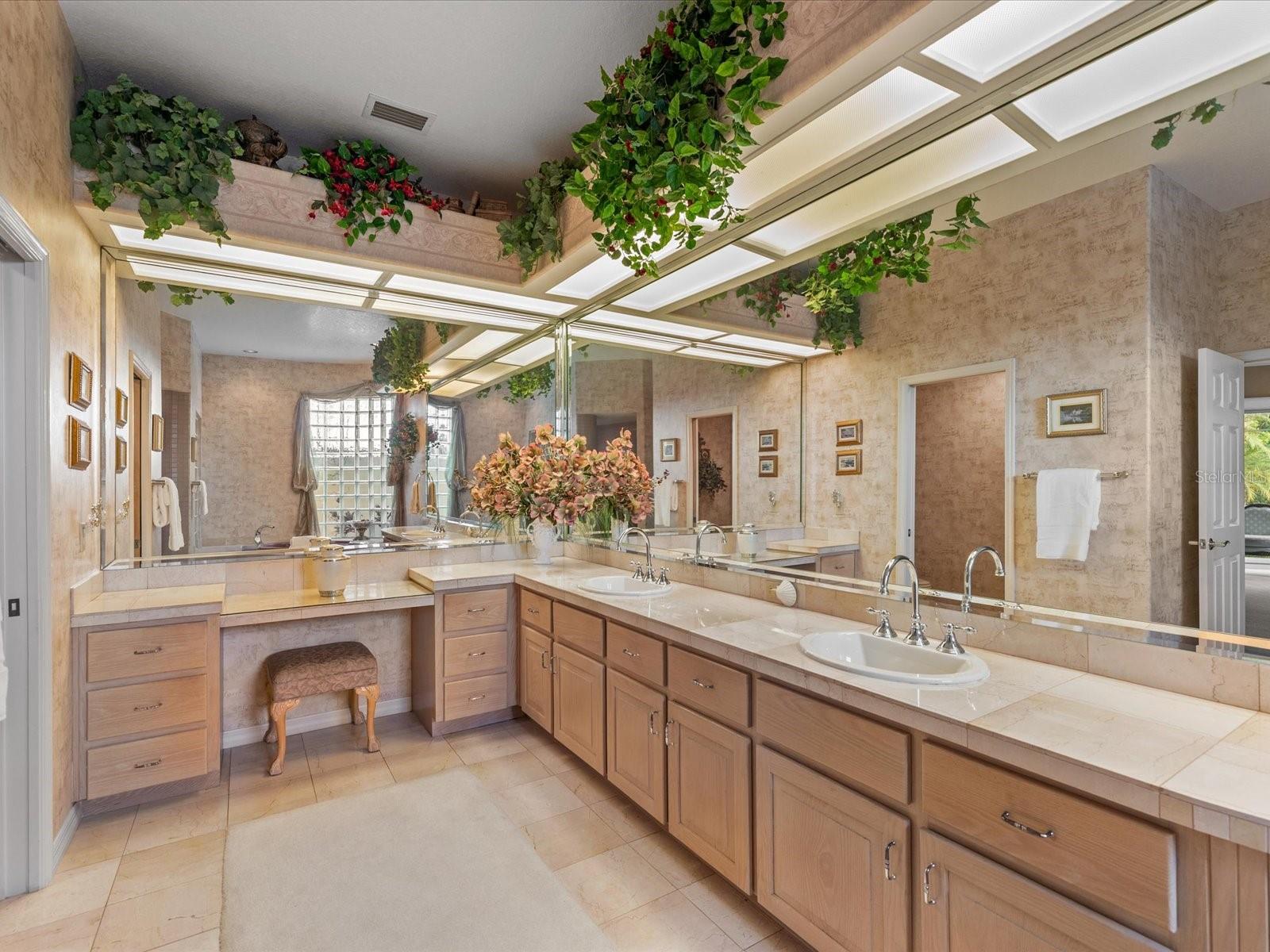 dual sinks, and a vanity