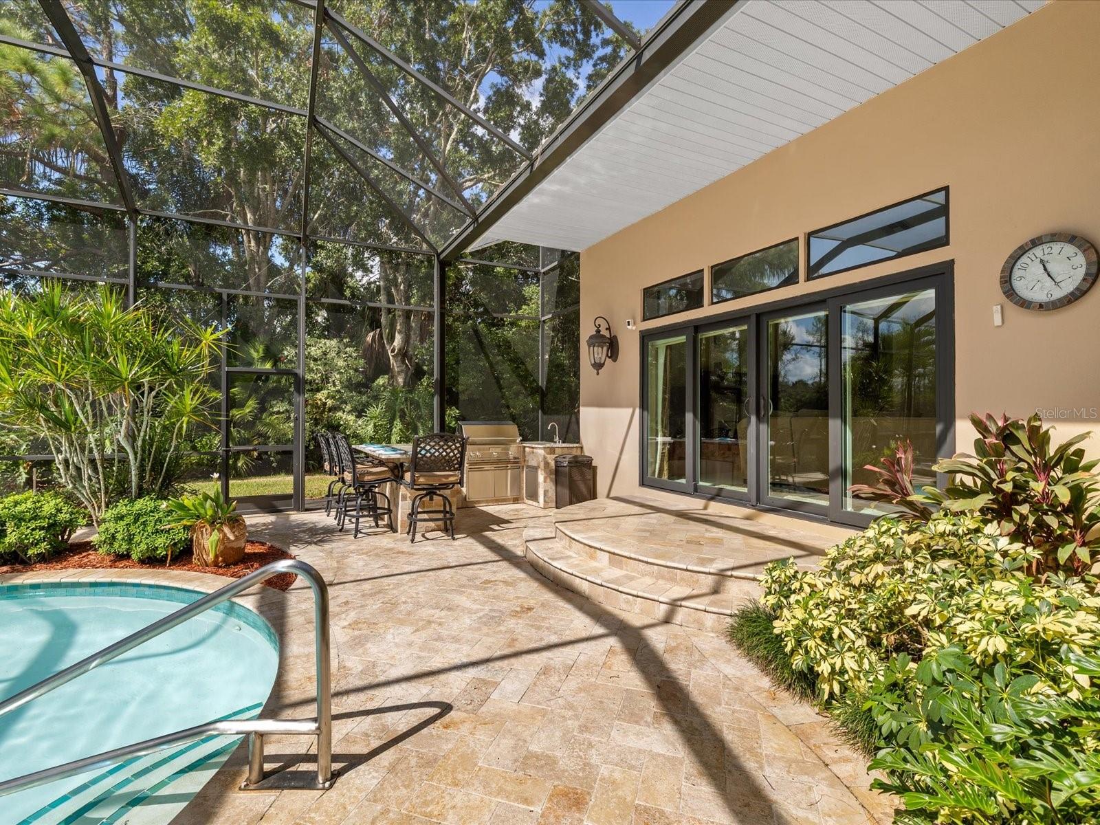 Sliding doors and out door kitchen.