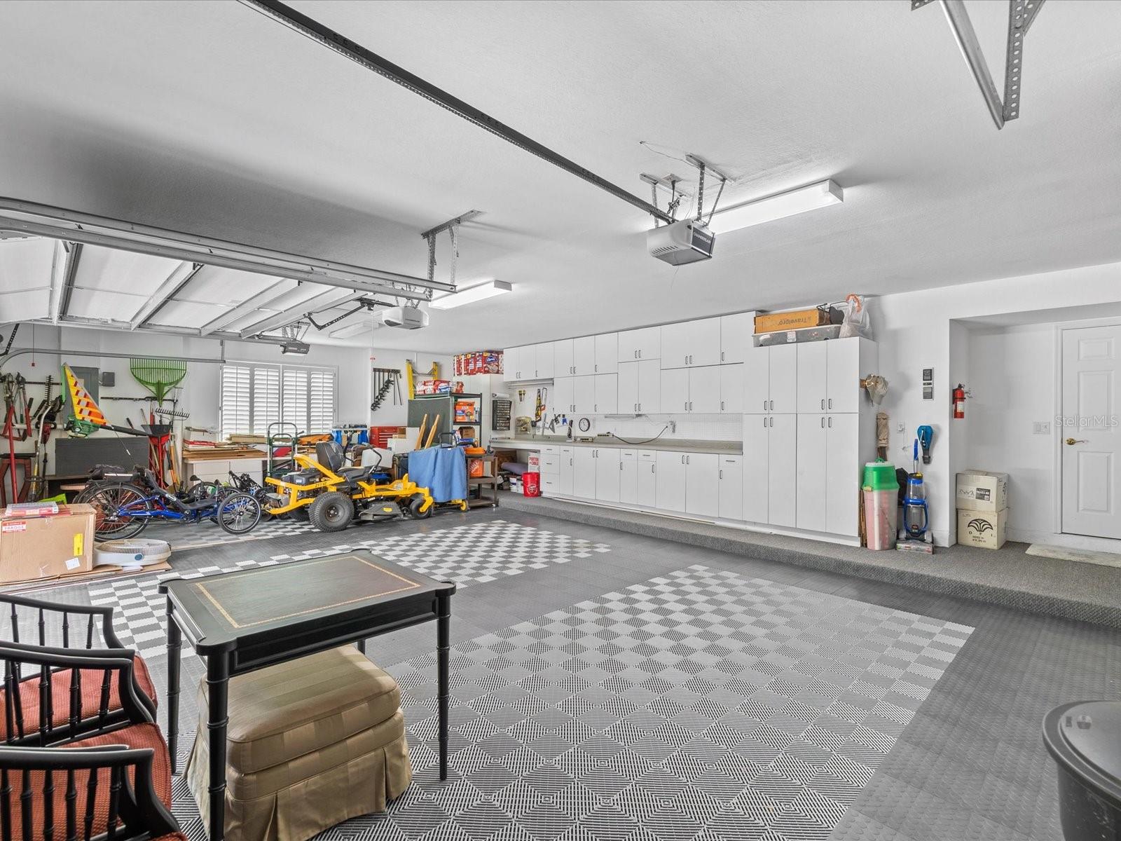 3 car garage with race deck flooring