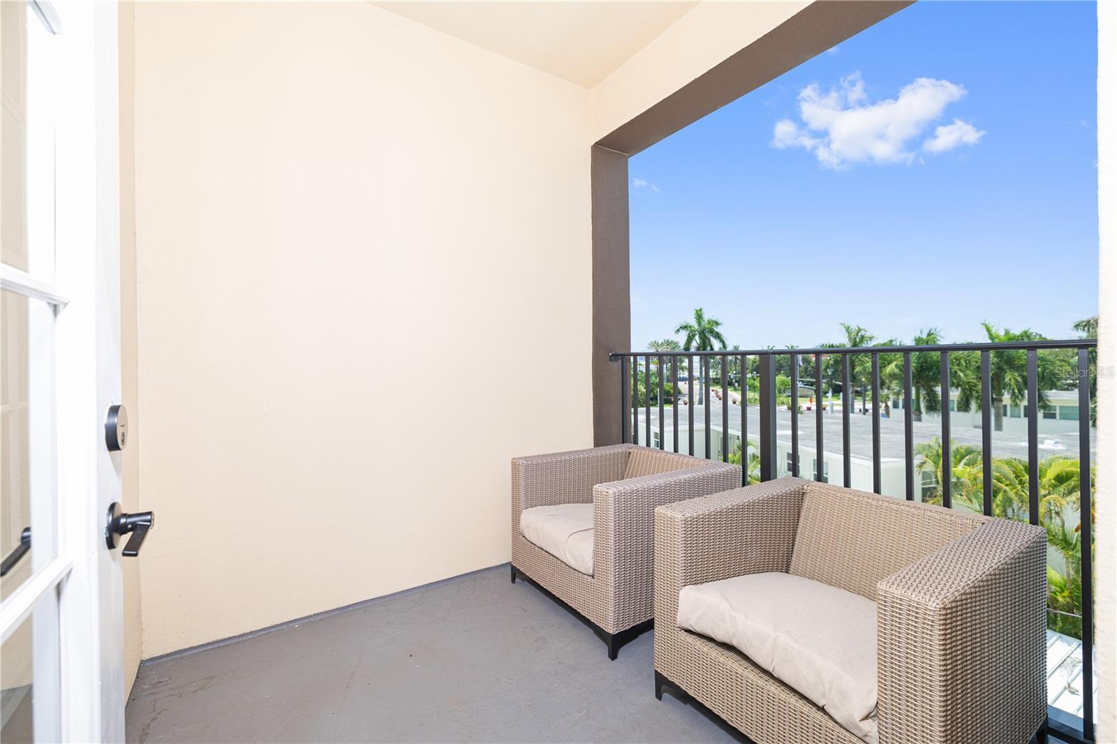 South facing balcony offers private outdoor space with views of the museum