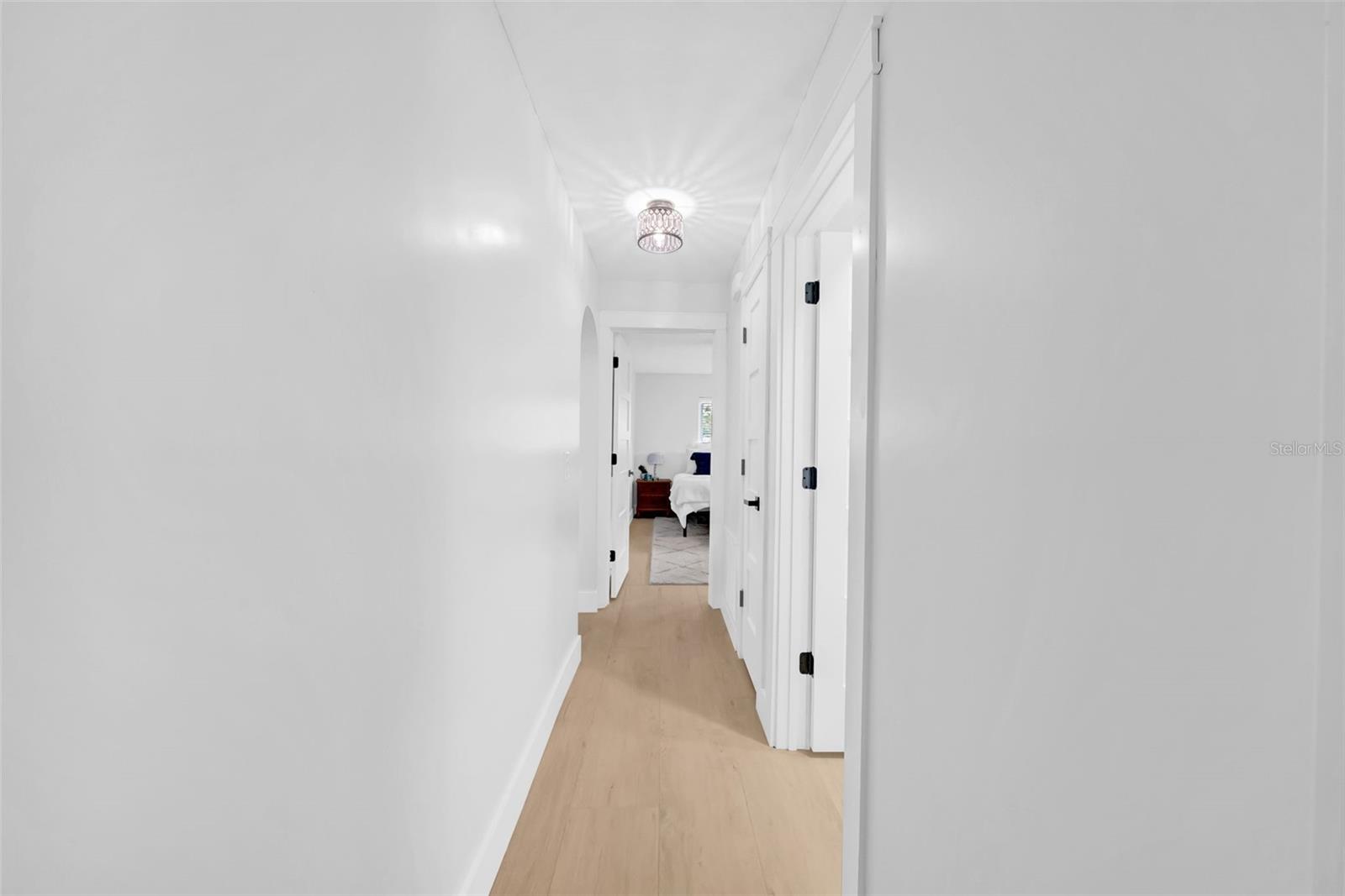 Hall for the 2 bedrooms and 2nd bathroom in the middle.