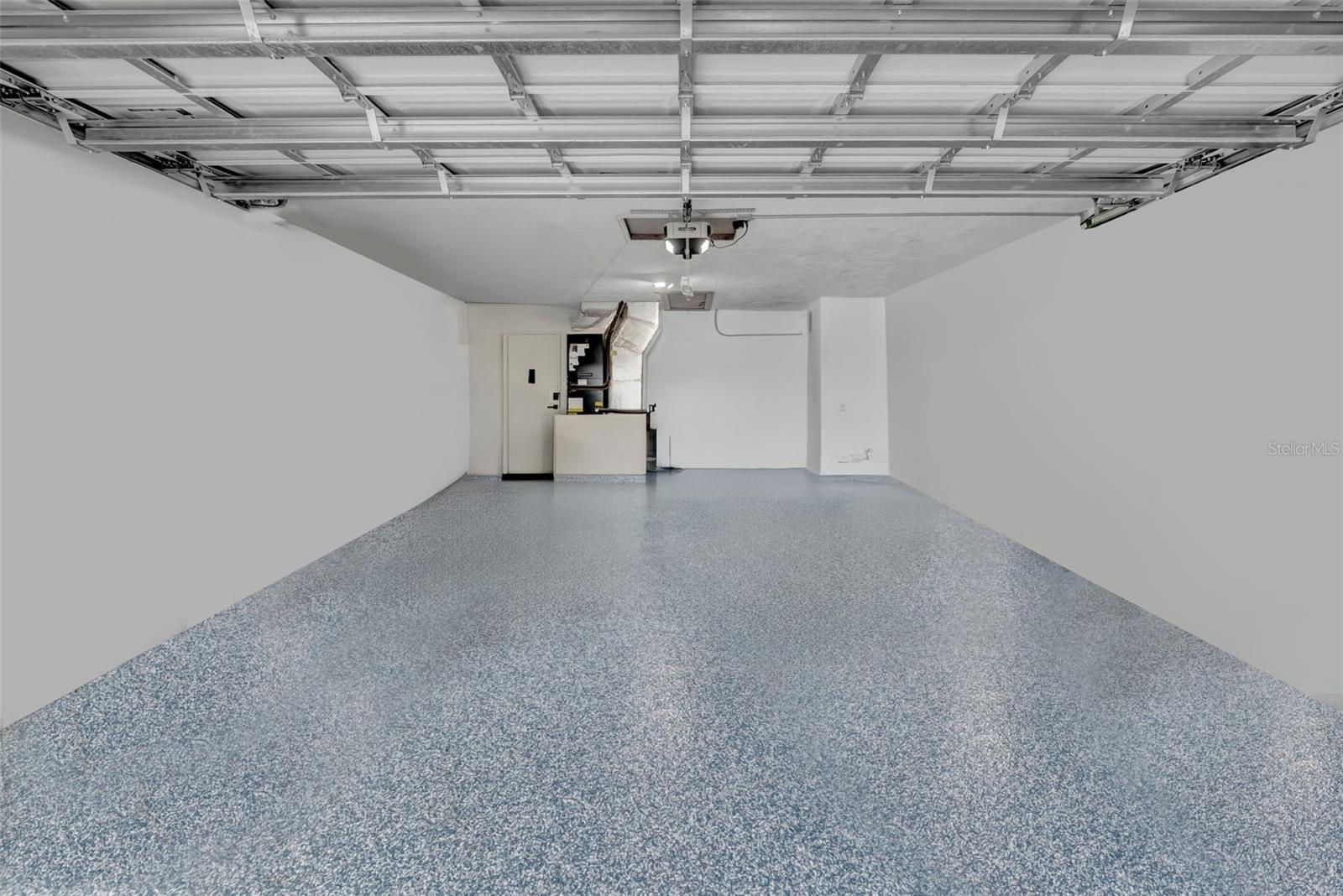 2 car garage with new expoxy flooring.