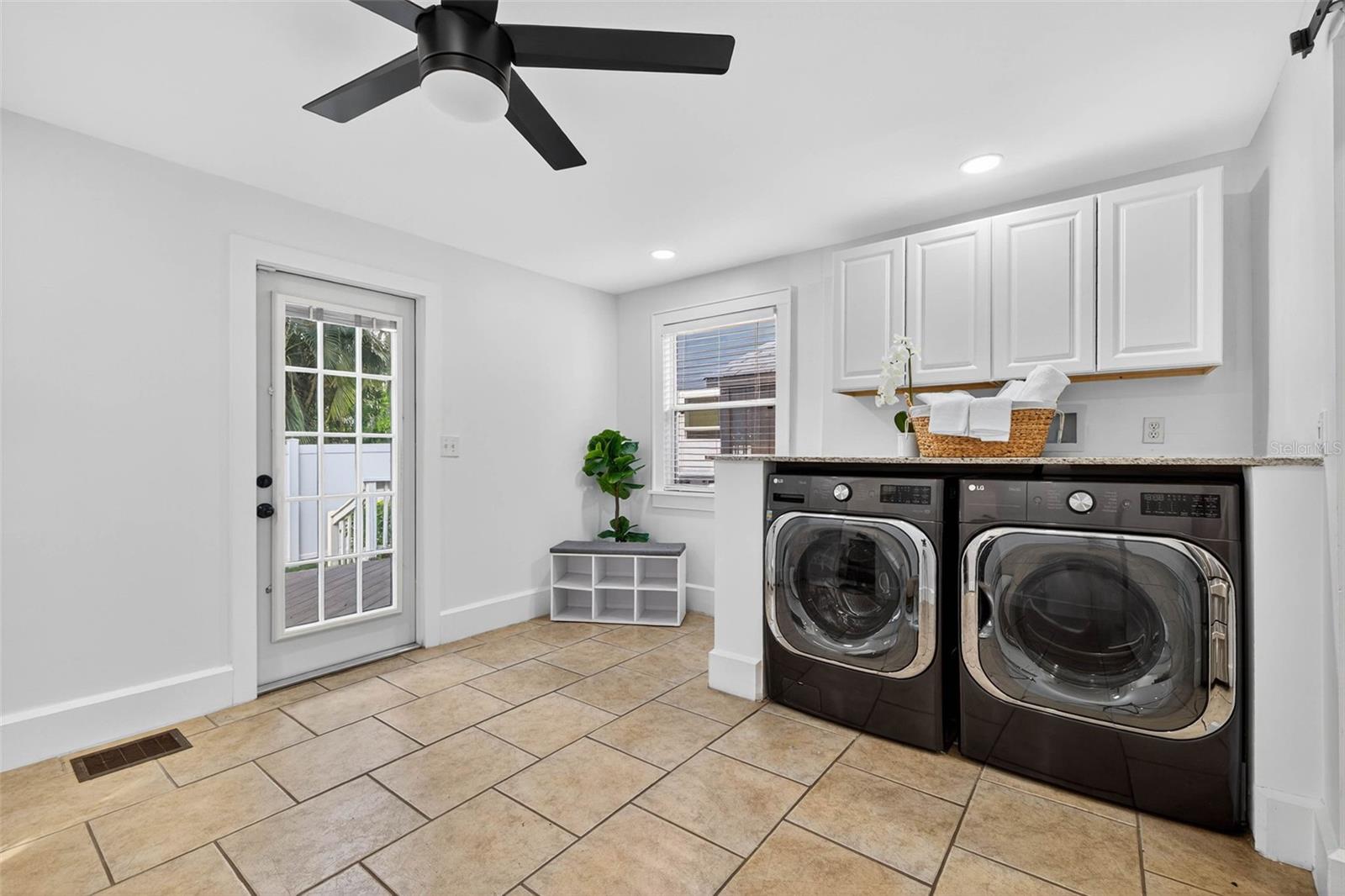 Downstairs Laundry/Mudroom Leading to the Back Porch & Yard