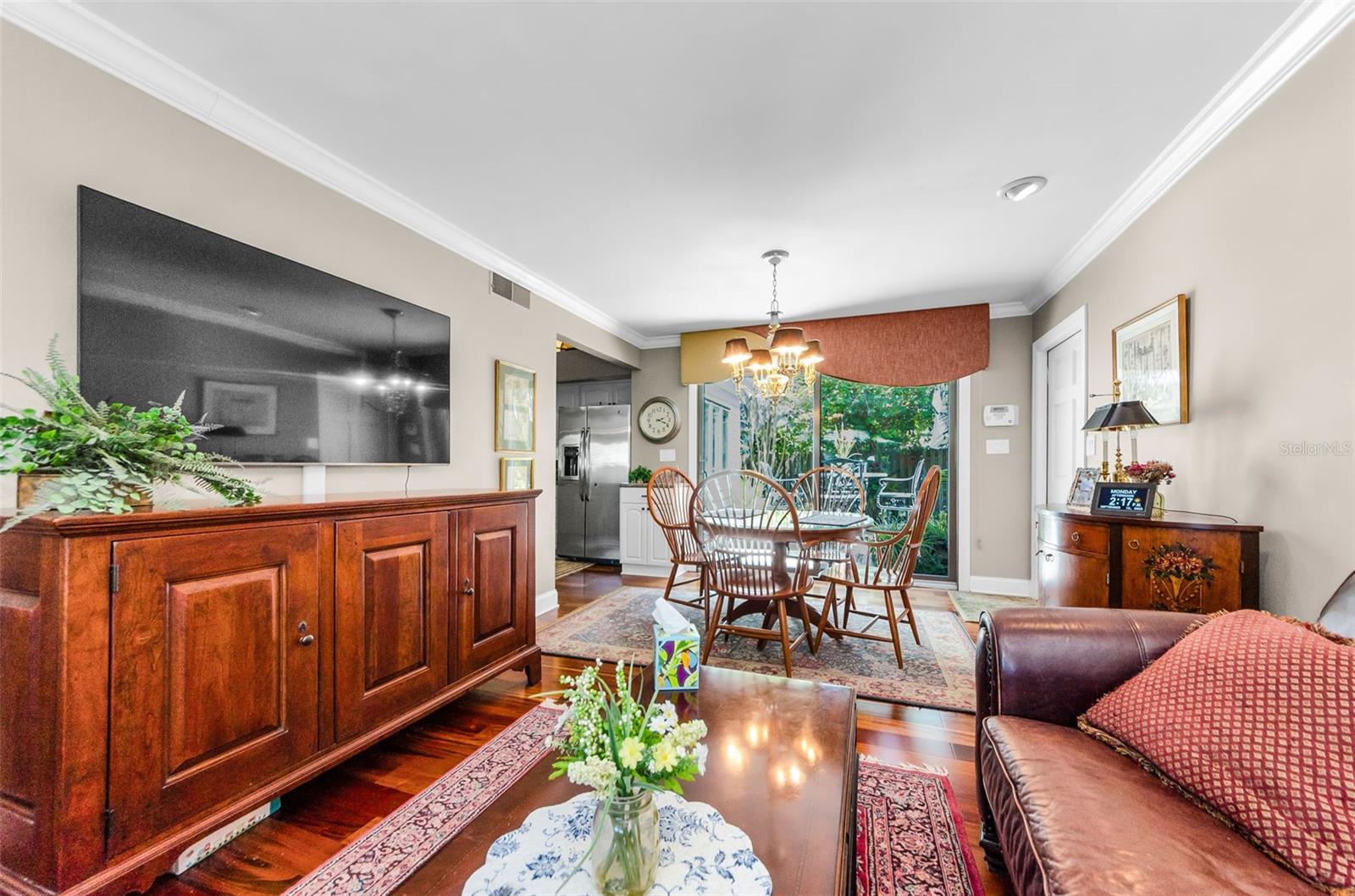 Den has access to the kitchen as well.  The perfect family zone on movie night!