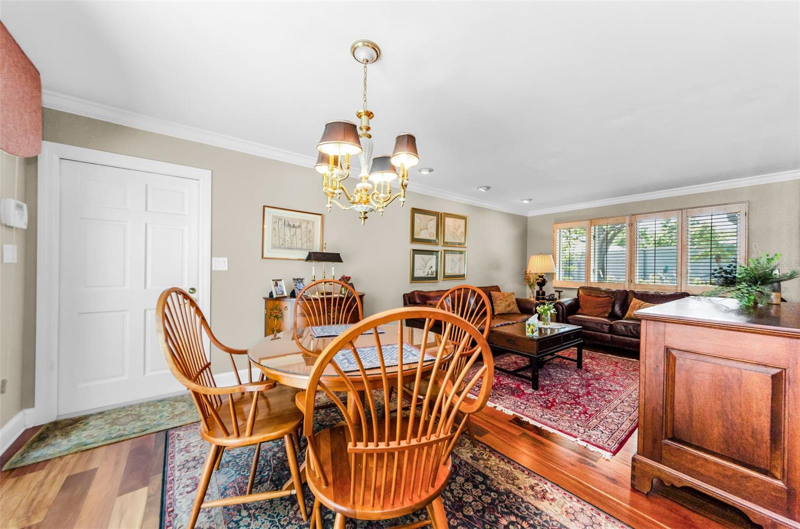 Cozy den with casual dining area and the door to the garage.  So gorgeous!