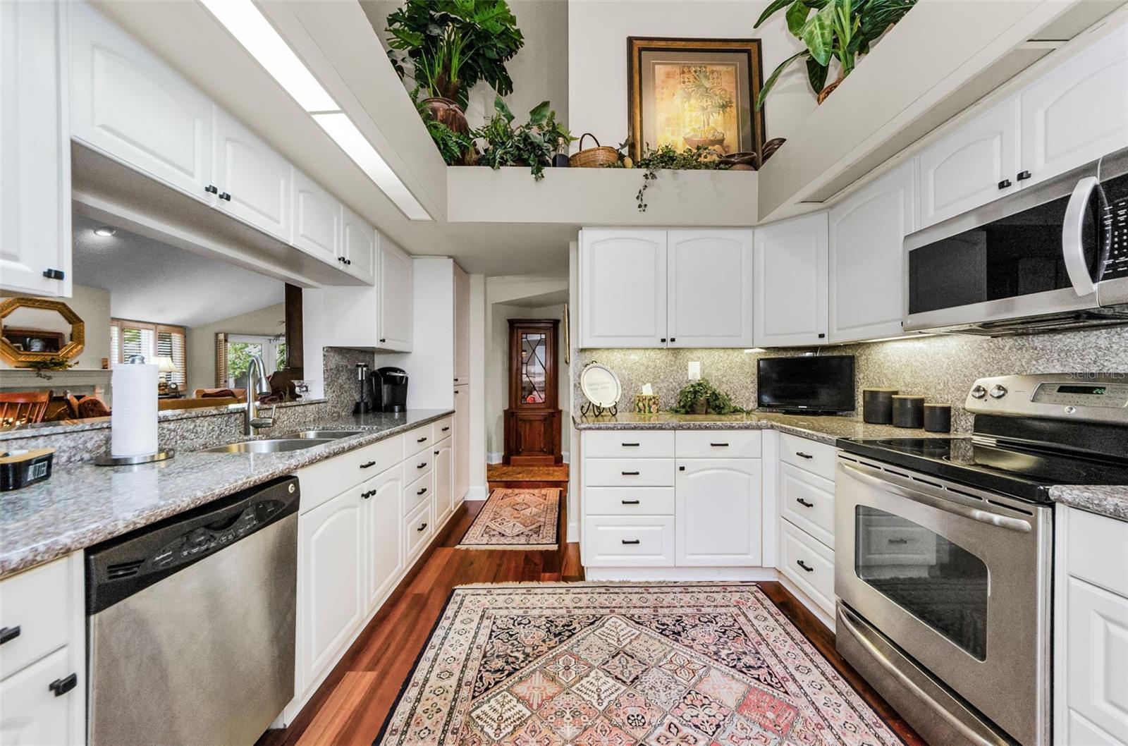 Granite countertops great appliances and so much storage and convenience!