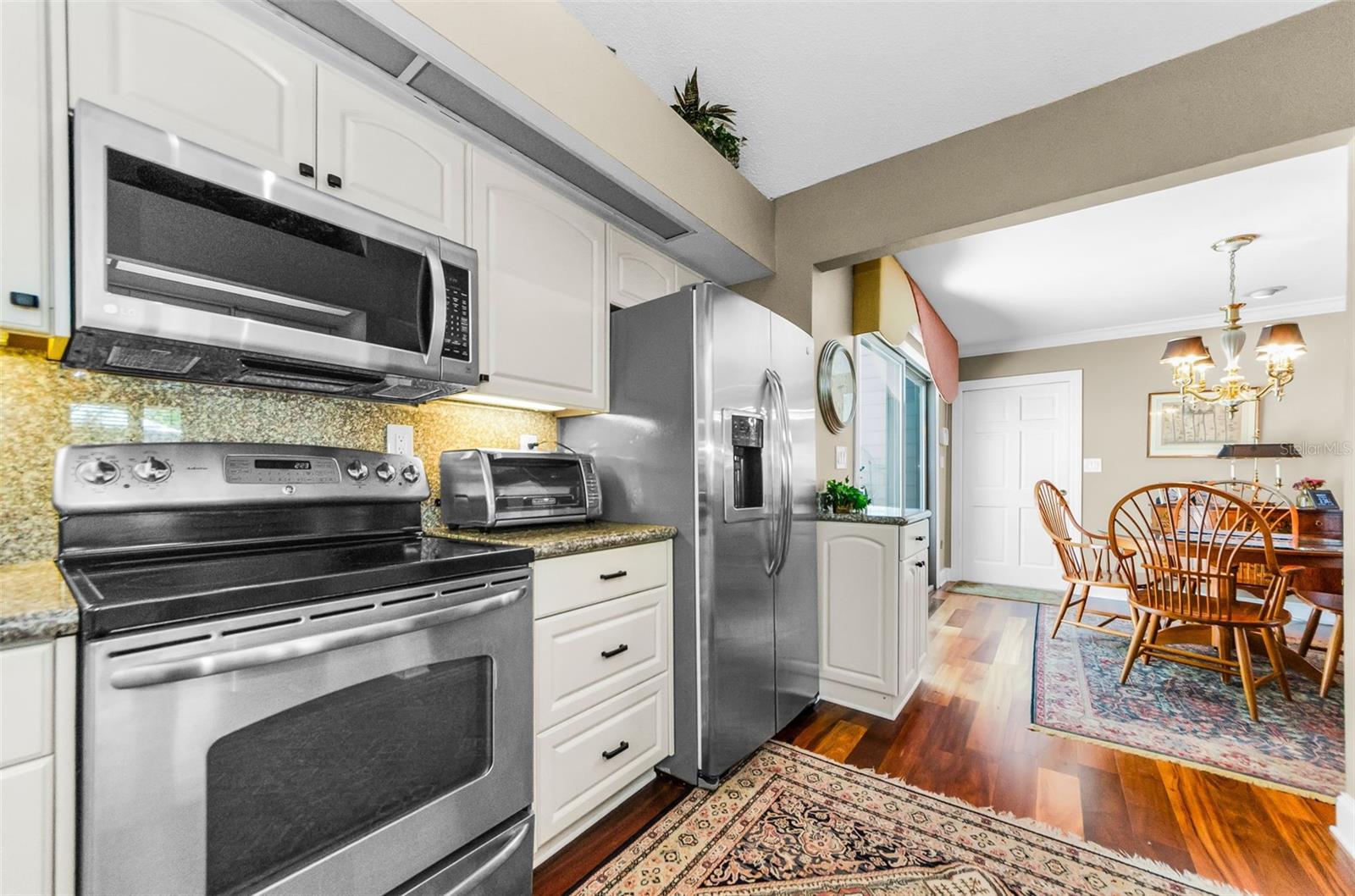 The kitchen and den will become your two favorite spaces, and they open to the garage!