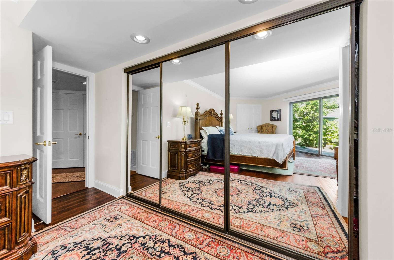 Reflection of the master bedroom from the 8' closet. There is also a huge walk in closet for the master suite!