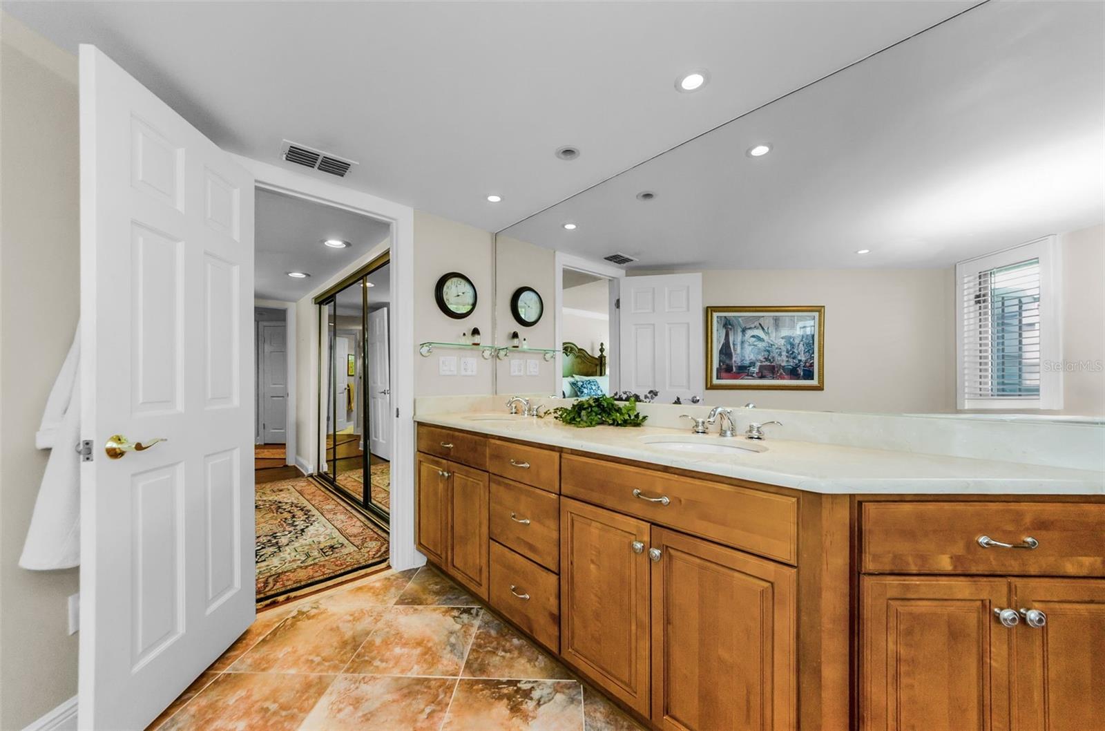 The master bath with double vanities...solid cabinetry and soaking tub and shower!