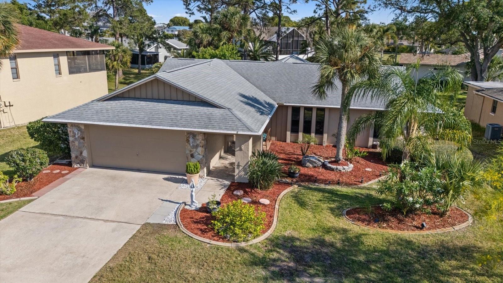 Front of home-Beautiful landscaping