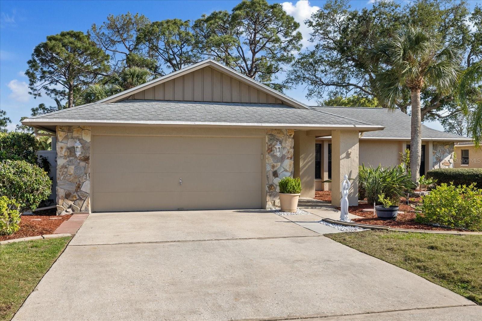 Wide driveway and Well maintained yard