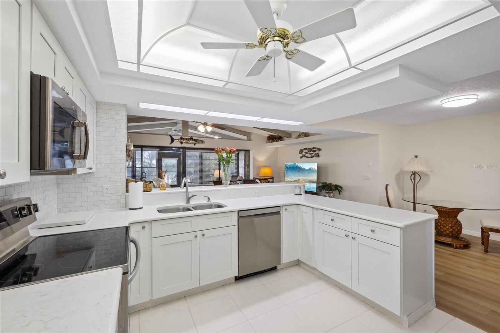 Open bright kitchen and living areas