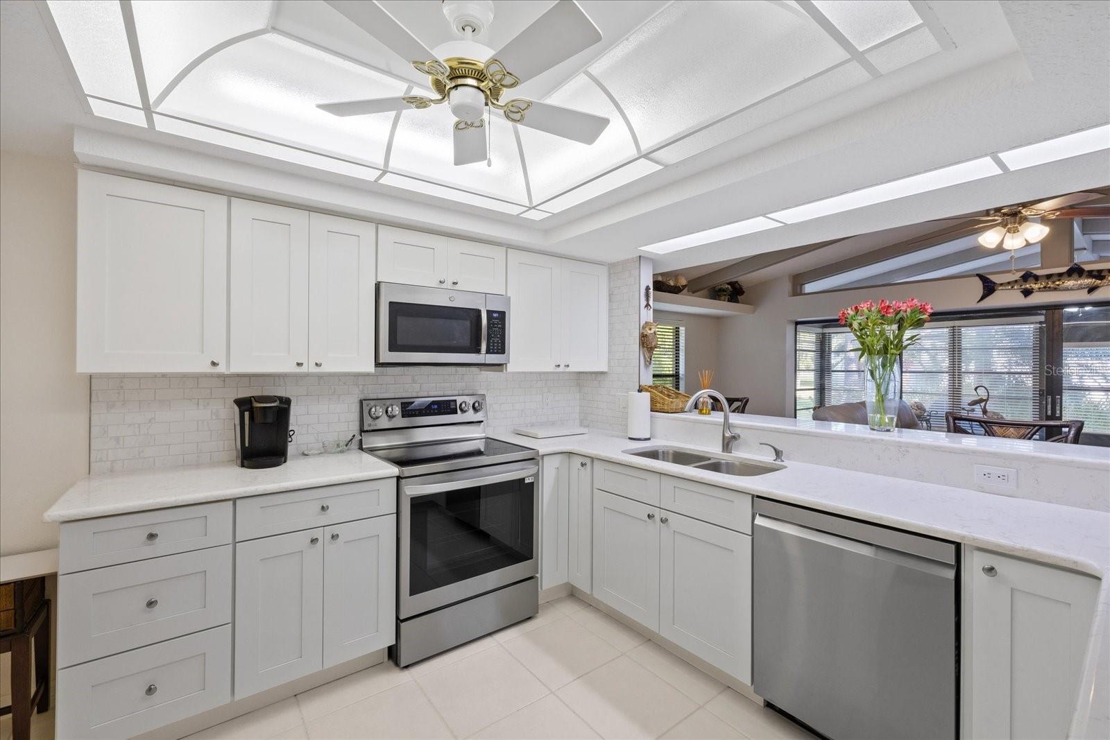Bright and updated open kitchen with NEW Stainless appliances