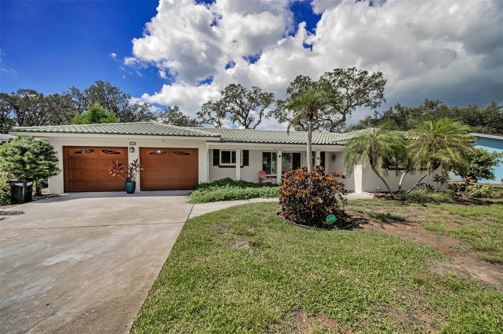 Step into timeless design and Coastal elegance with this striking Mid-Century residence!