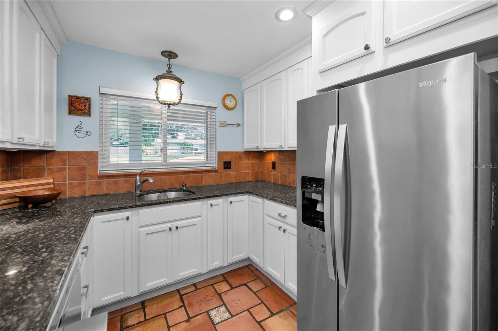 Ample counter and cabinet space in the Kitchen