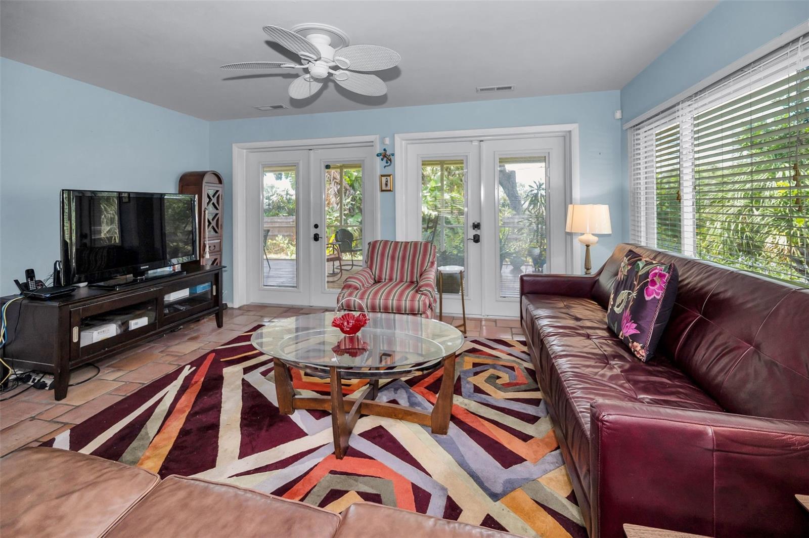 Wrapped in windows and kissed by sunshine, the Florida room brings the outdoors in!