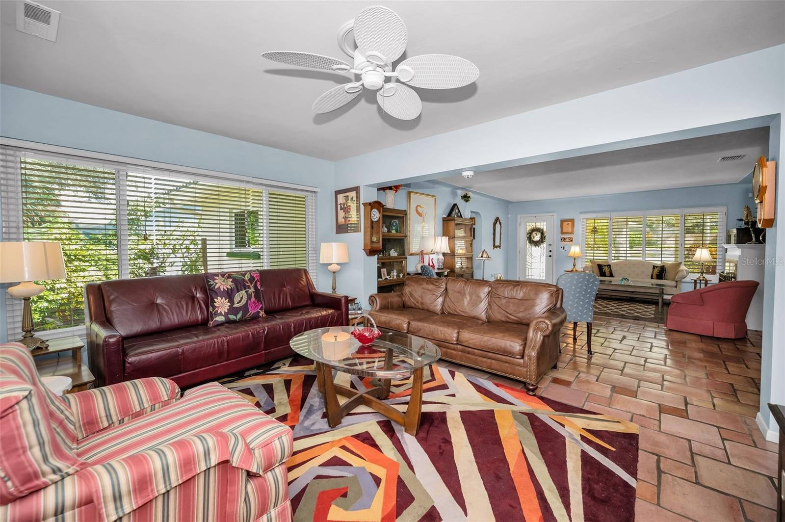 Wrapped in windows and kissed by sunshine, the Florida room brings the outdoors in!