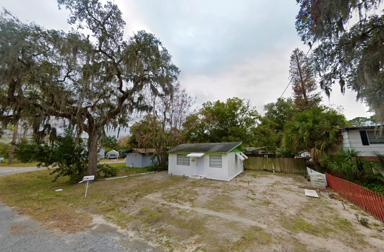 REMOVE THAT REAR FENCE AND REPLACE IT WITH A NEW PRIVACY FENCE, INSTALL IT FURTHER BACK, CLOSER TO THE PROPERTY LINE, TO BORDER THE PERIMETER OF THE YARD.  YOU WILL ALSO FIND A CONCRETE PAD BEHIND THE FENCE.