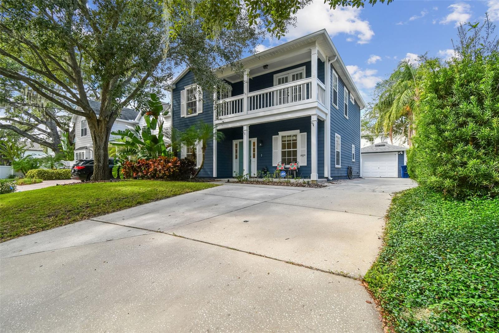 Ample Parking w/ Parking Pad, Deep Driveway, and 1-Car Garage